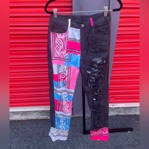 Black graphic ripped jeans